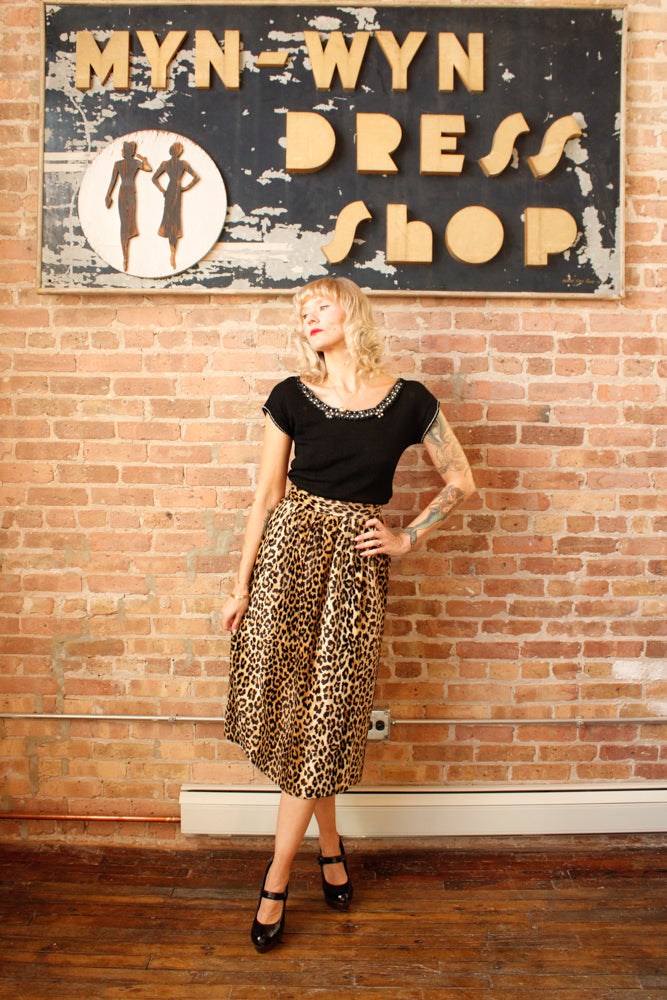 Sustainable, Eco-friendly, secondhand vintage fashion

~1950s Gorgeous Black knit top

~embellished rhinestone and beaded neckline