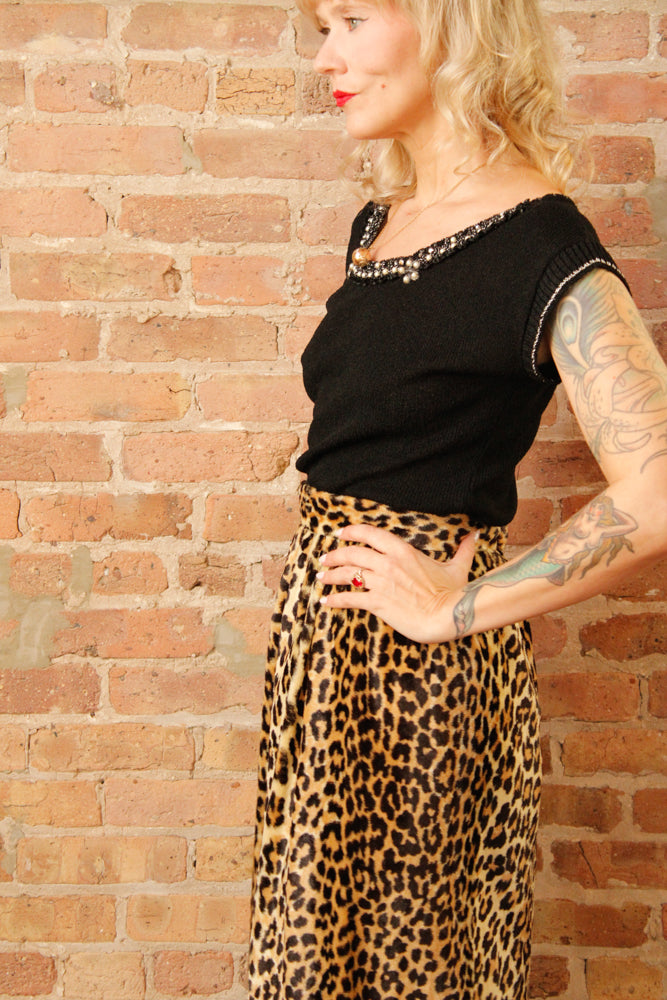 Sustainable, Eco-friendly, secondhand vintage fashion

~1950s Gorgeous Black knit top

~embellished rhinestone and beaded neckline